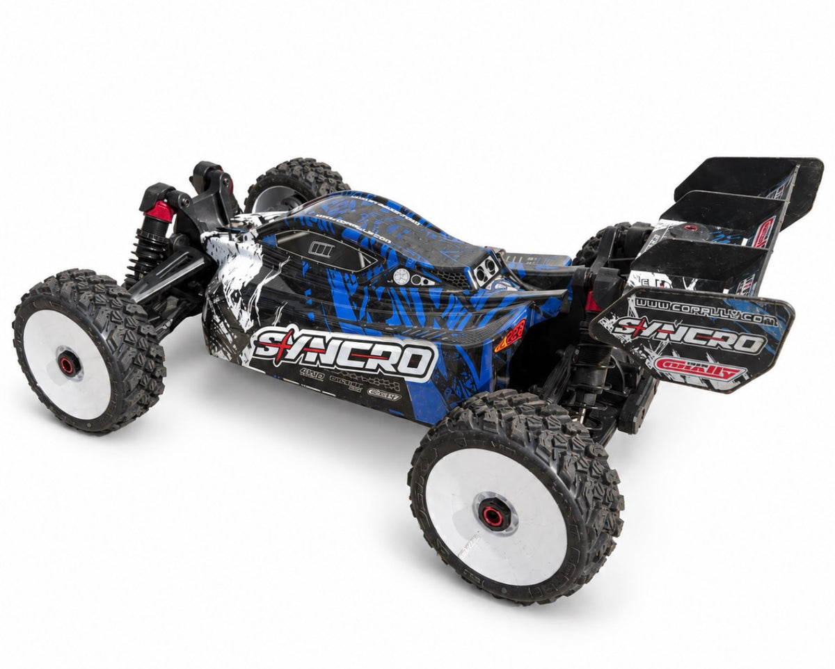 Used Team Corally Syncro 2WD 1/8 Brushless RC Buggy – Blue – CT2S Radio. Used only a few times.